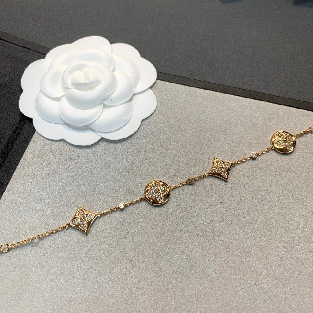 GlowSTAR AND SUN 4 MOTIFS GOLD DIAMONDS BRACELET