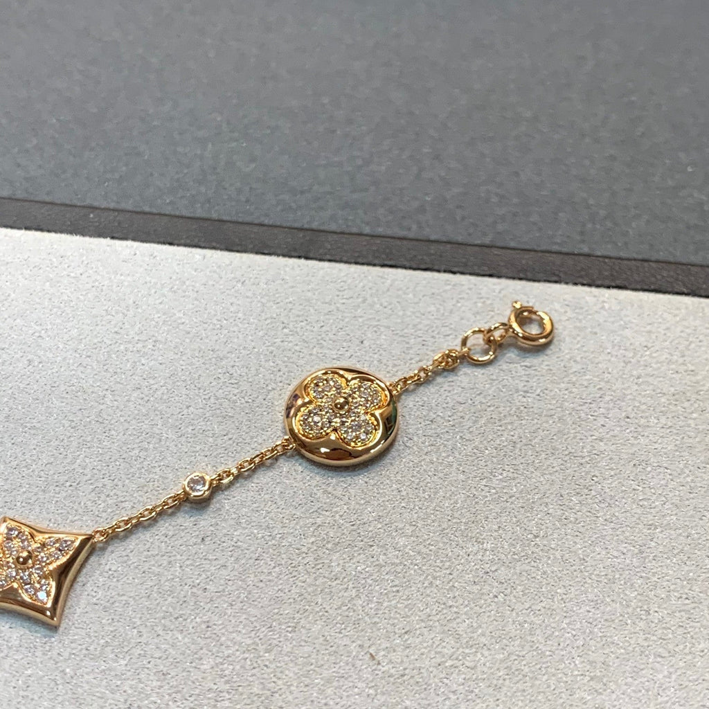 GlowSTAR AND SUN 4 MOTIFS GOLD DIAMONDS BRACELET