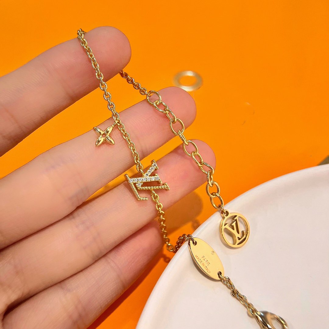 GlowLOGO STAR MOTIF GOLD BRACELET