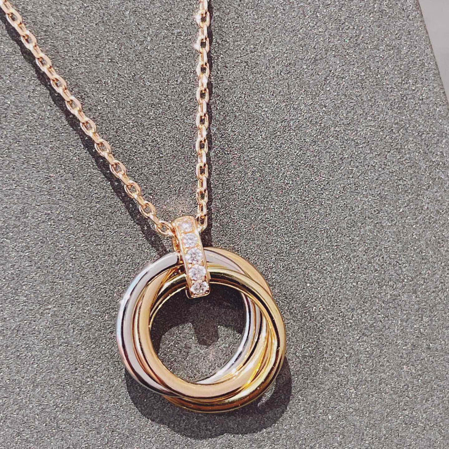 GlowTRINITY NECKLACE GOLD  DIAMONDS