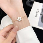 ¡®Glow¡¯LUCKY WHITE MOP PLUM BLOSSOM  BRACELET