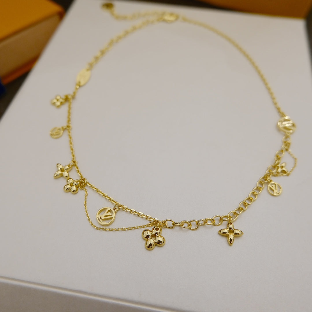 GlowBLOOMING SUPPLE NECKLACE BRASS