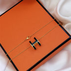 GlowHM CLIC BLACK ENAMEL GOLD NECKLACE