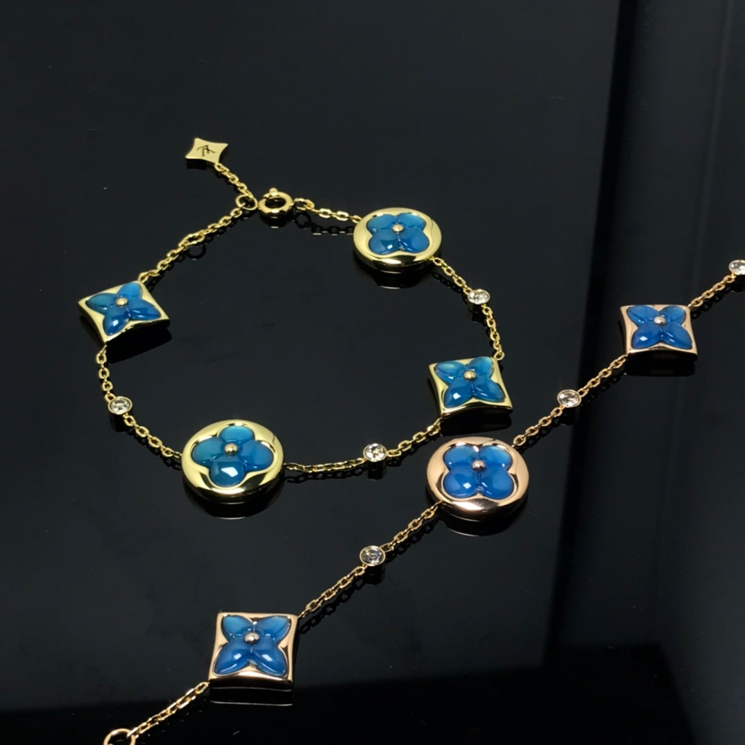 GlowSTAR AND SUN 4 MOTIF BLUE BRACELET